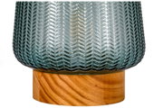 Close-up van grijze gestructureerde glazen lamp op houten voet, decoratieve woonverlichting