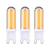Three G9 LED bulbs with warm white light and white plastic base for energy-efficient lighting