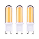 Drei LED-Leuchtmittel mit G9 Sockel in warmweißem Licht und weißem Kunststoffgehäuse