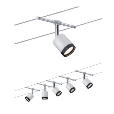 Modern cable lighting system with six white metal LED spotlights for flexible room illumination