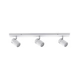 Three white LED spotlights with chrome accents on white rail for modern room lighting