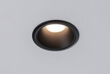 Schwarzer Einbaustrahler aus Metall mit warmweißem LED-Licht in weißer Decke für moderne Beleuchtung