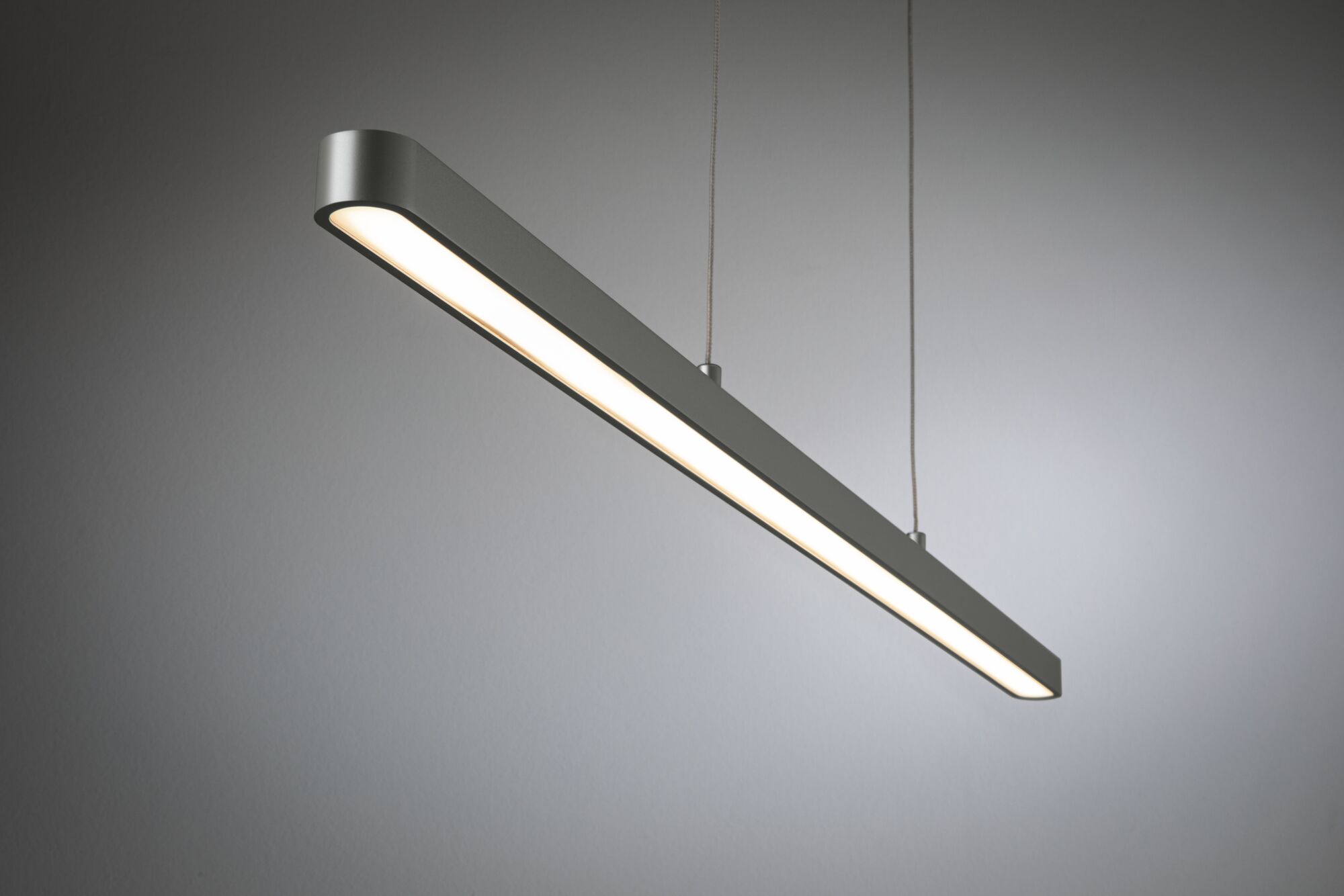 Moderne LED-Pendelleuchte aus Aluminium in Grau mit warmweißem Licht für Wohnräume