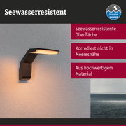Schwarze Außenwandleuchte mit seewasserresistenter Oberfläche und warmweißem Licht für Meerumgebung