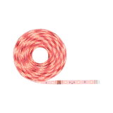 Roll of red LED strip light with flexible plastic coating for decorative lighting use.