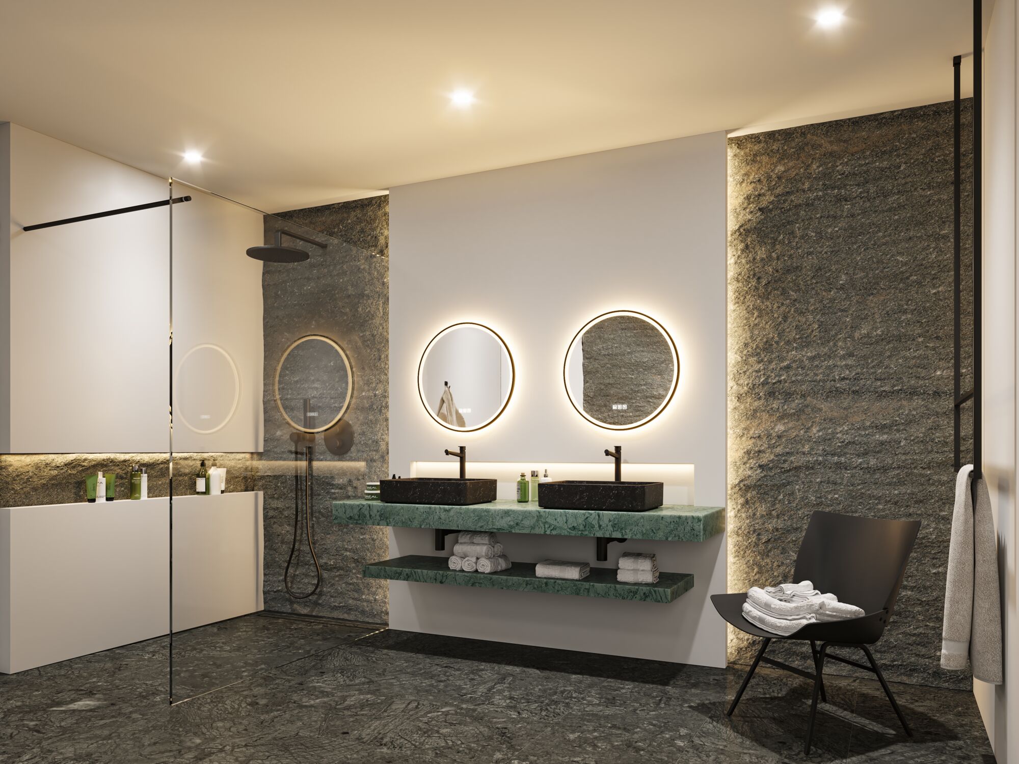 Salle de bain moderne avec meuble en marbre vert, vasques noires et miroirs ronds éclairés, éclairage LED