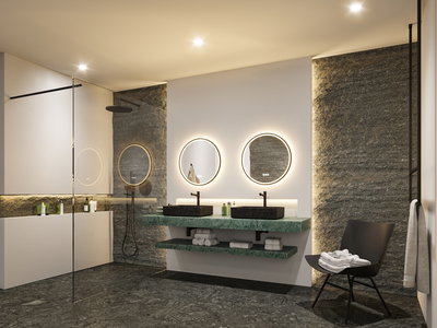 Modern bathroom with green marble vanity, black basins, and illuminated round mirrors, LED bathroom lighting