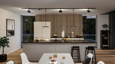 Modern kitchen with white island, wood panel wall and black Paulmann LED ceiling spotlights for living space lighting