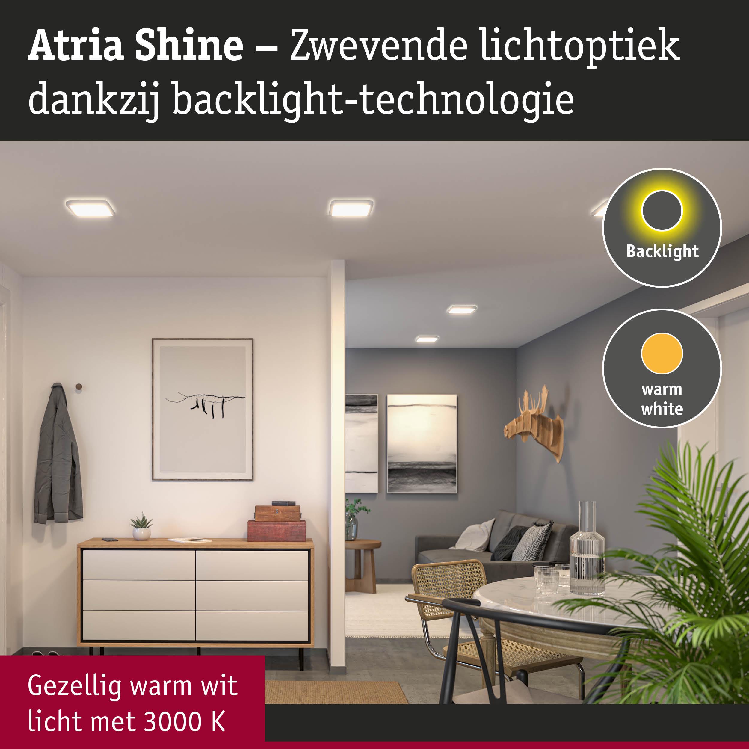Woonkamer met Atria Shine LED-plafondlampen in warm wit licht en moderne inrichting