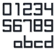 Black solar house numbers with white edges made of plastic for energy-saving home numbering