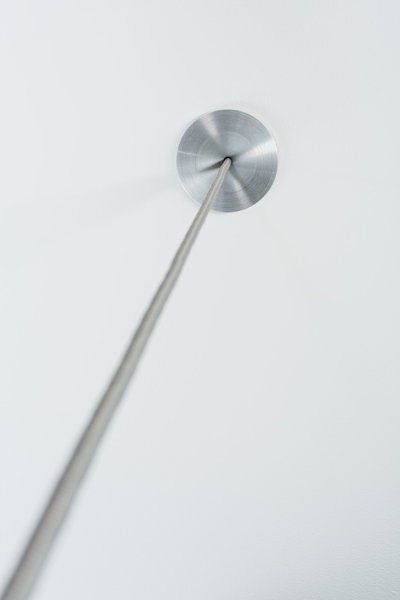 Ceiling with brushed aluminum canopy and grey cable for modern pendant light fixture