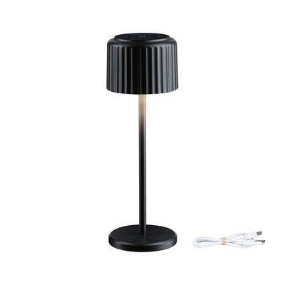 Black metal LED table lamp with ribbed shade and USB charging cable for modern lighting solutions