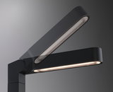 Black metal LED desk lamp with adjustable arm for modern workspace lighting