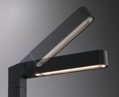 Black metal LED desk lamp with adjustable arm for modern workspace lighting