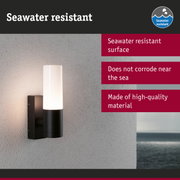 Black outdoor wall light with white glass, seawater resistant for coastal use