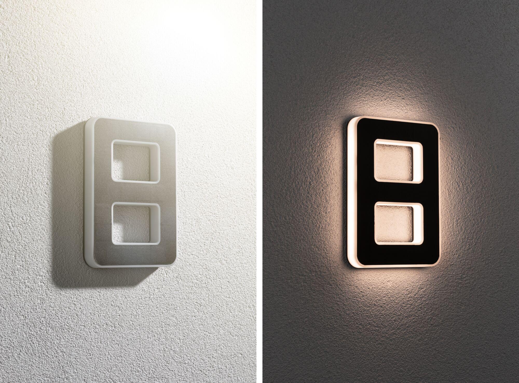 Modern rectangular LED wall light in white and black with indirect lighting effect.