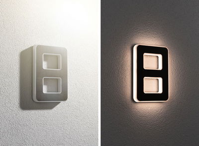 Modern rectangular LED wall light in white and black with indirect lighting effect.