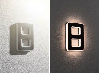 Modern rectangular LED wall light in white and black with indirect lighting for living spaces