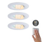 Three white LED recessed lights with adjustable color temperature and hand on white wall switch.