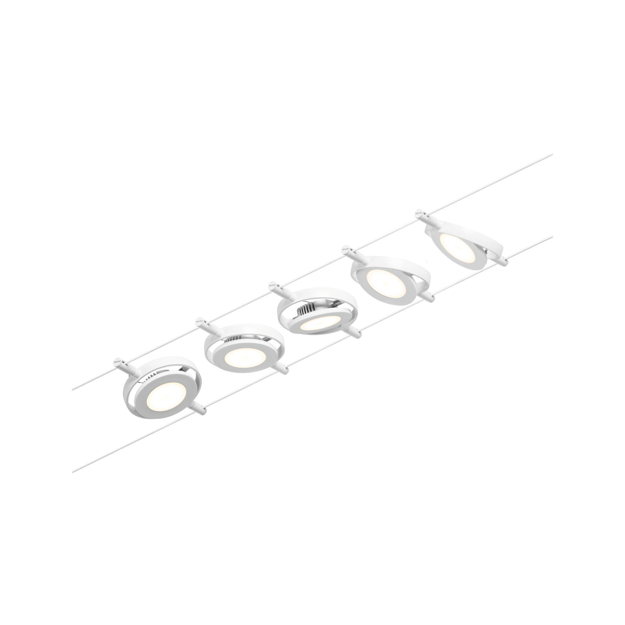 Modern white LED cable system with five round adjustable metal spotlights for flexible lighting solutions