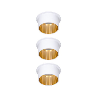 Three white recessed lights with gold reflector for modern LED ceiling lighting