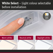 Finger adjusting light colour on white plastic switch, LED light options warm, neutral and daylight white