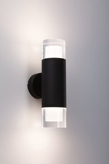 Moderne sort metal væglampe med klart akrylglas og varmt hvidt LED-lys til indendørs brug