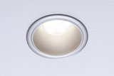 Round LED recessed spotlight with silver aluminum frame and warm white light for living spaces
