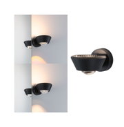 Black metal wall light with conical shape and LED illumination for modern interior lighting