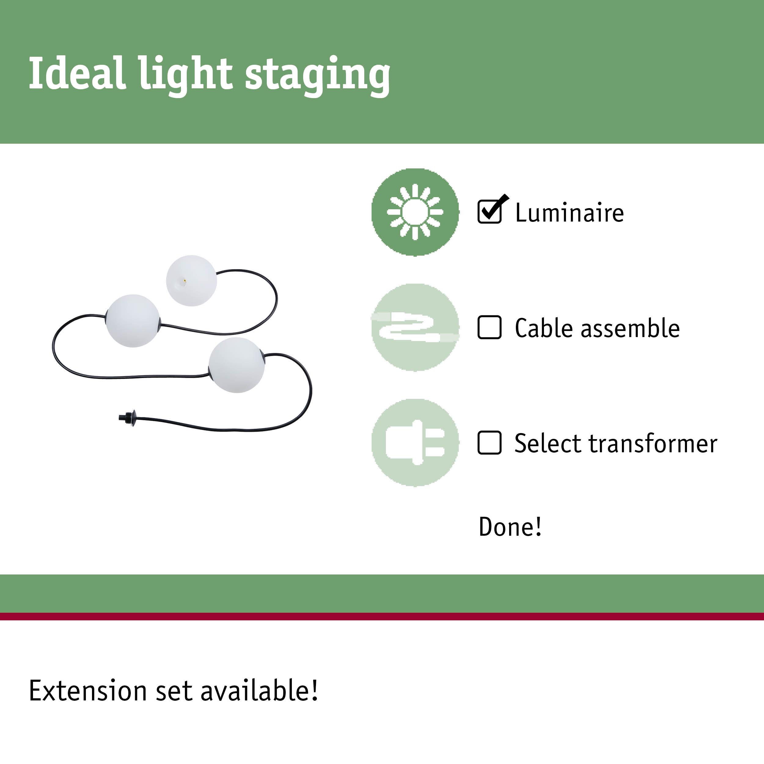 Three white globe luminaires with black cable for flexible light staging without cable or transformer.