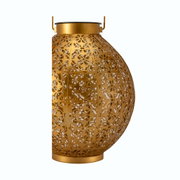 Gold metal lantern with intricate floral cutout design for decorative indoor lighting
