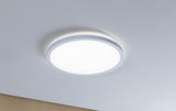 Round white LED ceiling light made of plastic with warm white light for living spaces