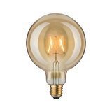 Round LED bulb with amber glass and visible filaments for decorative lighting and warm ambiance