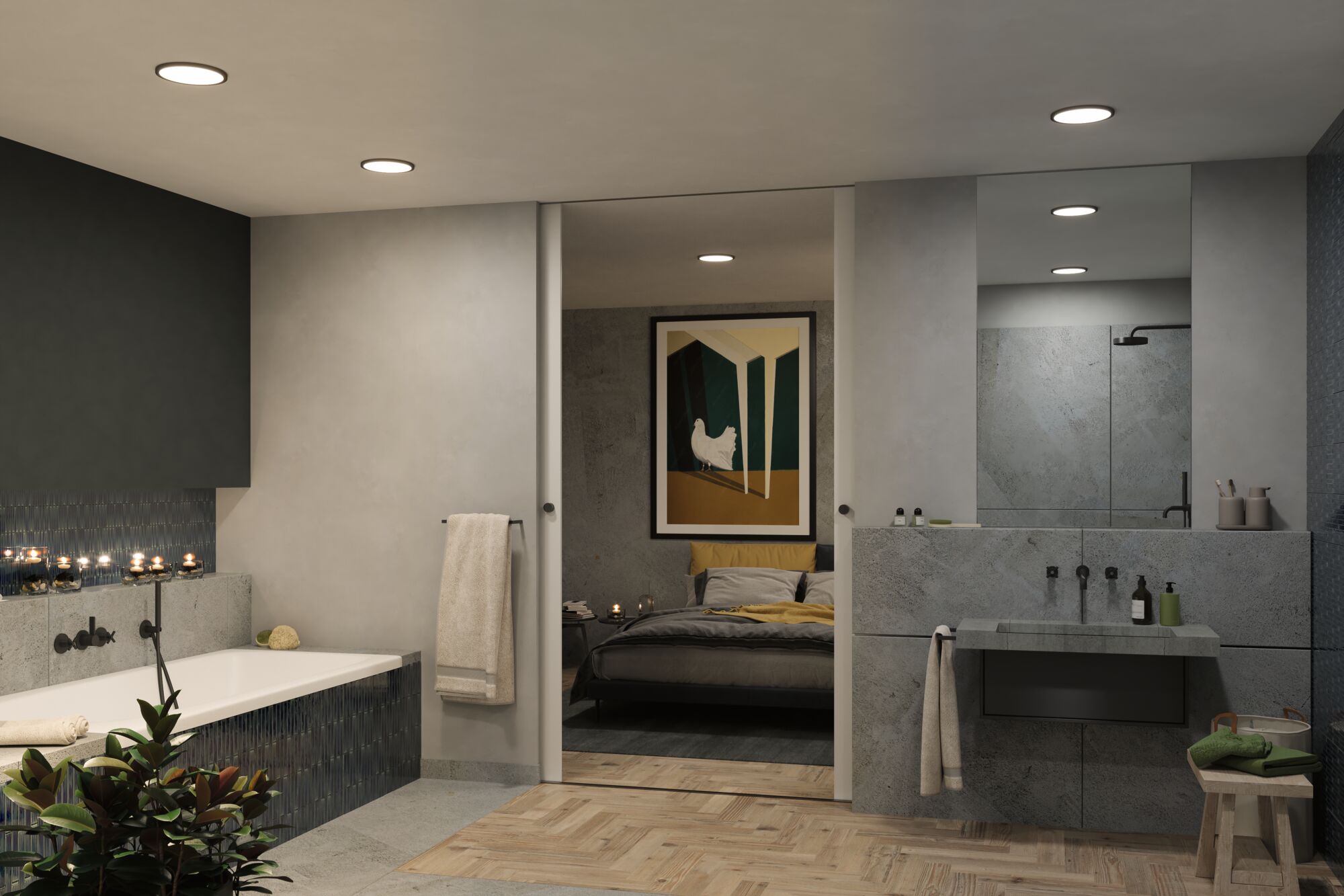 Modern bathroom with grey stone wall, recessed ceiling lights, and bathtub with blue tiles