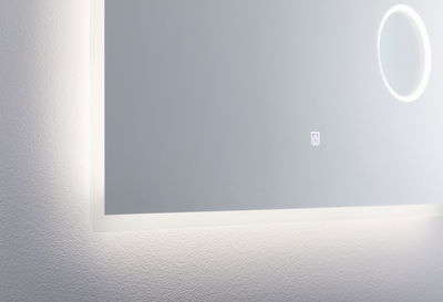 Modern LED mirror light with touch switch and round magnifying glass in white for bathroom lighting