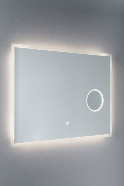 Rectangular LED mirror with white frame and illuminated magnifying circle for modern bathroom lighting.