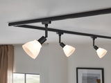 Three-light black track lighting with white glass shades for modern home illumination
