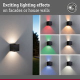 Black wall light with colorful lighting effects for facade and house wall illumination