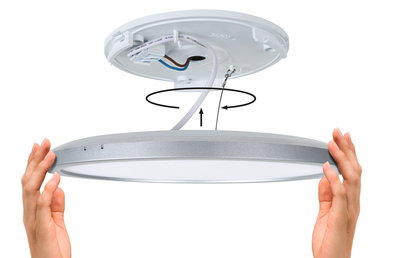 Installation of round ceiling light fixture in silver and white with wiring and twist-lock mechanism