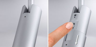 Zilverkleurige aluminium behuizing met schuifschakelaar, close-up van vinger die bedient, LED-lichtbediening