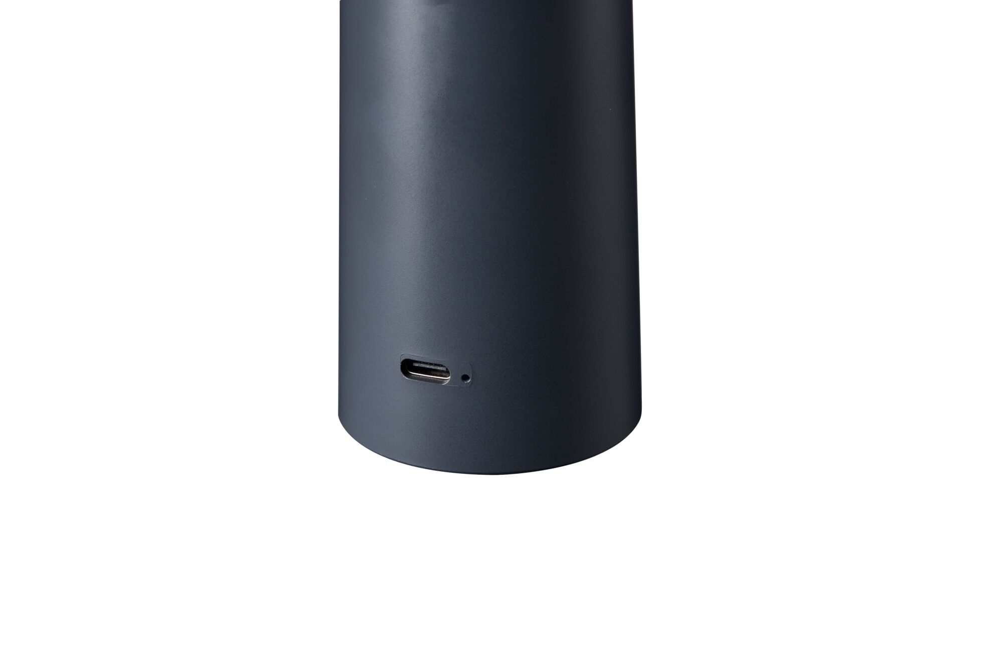 Black cylindrical device with USB-C port, modern electronic accessory with matte finish