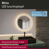 Runder Mirra LED Leuchtspiegel mit warmweißem Licht und schwarzem Waschbecken im modernen Badezimmer.