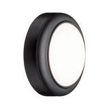 Rund LED-væglampe med sort hus og hvid diffuser til moderne indendørs belysning