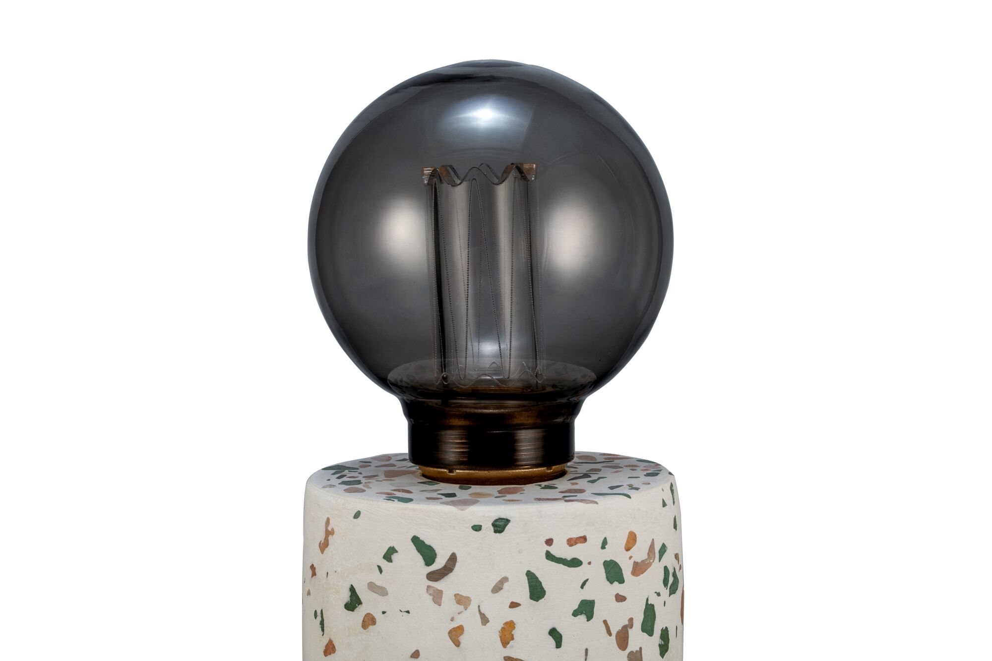 Round smoked glass bulb on terrazzo lamp base with colorful chips, decorative LED lighting