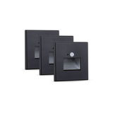 Set of three black metal LED stair lights with motion sensor for energy-efficient lighting
