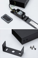 Sort metalhus med klemrække og monteringsbeslag inklusive skruer til LED-belysning