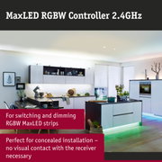 Modern white kitchen featuring RGBW MaxLED Controller 2.4GHz with colorful LED floor lighting