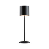 Lampe de table noire en métal avec abat-jour rond et base stable pour un éclairage moderne