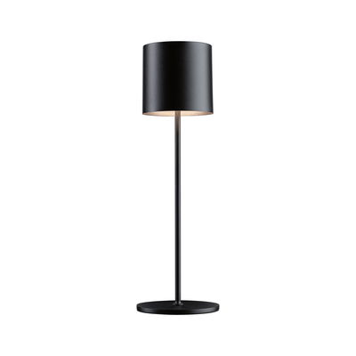 Lampe de table noire en métal avec abat-jour rond et base stable pour un éclairage moderne