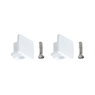 Two white plastic cover caps with screws for furniture assembly, practical mounting accessories